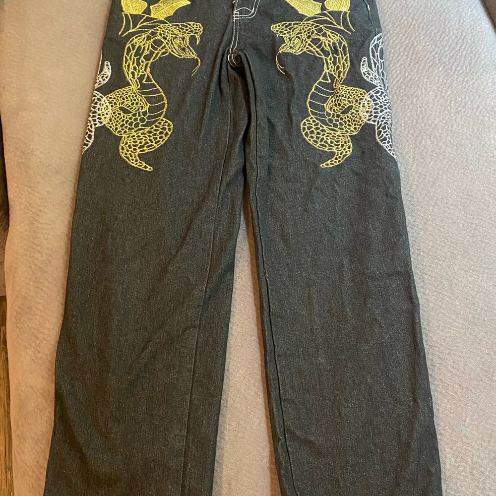 Black Jeans with Yellow Snake Design